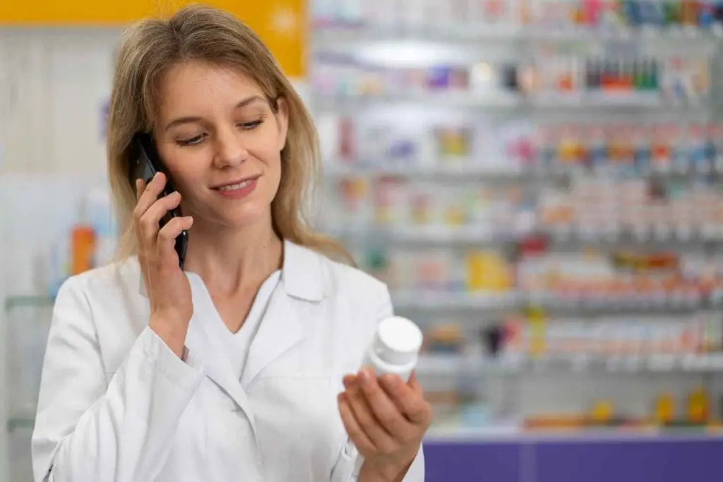 a_woman_with_a_pharmacy_diploma_online_is_checking_medicine_label