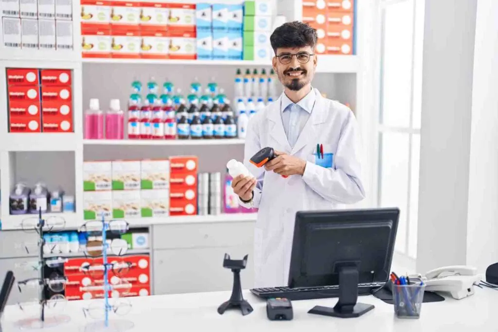 a_young_man_with_a_pharmacy_diploma_online_is_posing_for_a_picture