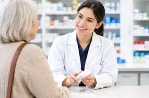 pharmacy assistant in bc doing her job