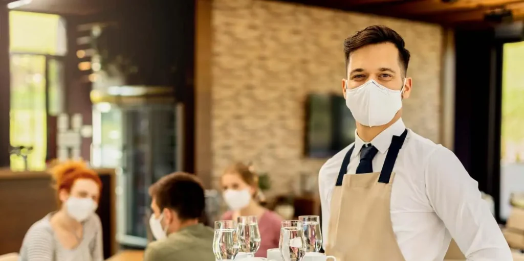 a man works in hospitality industry