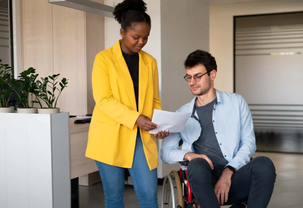 a community support worker helping an old man
