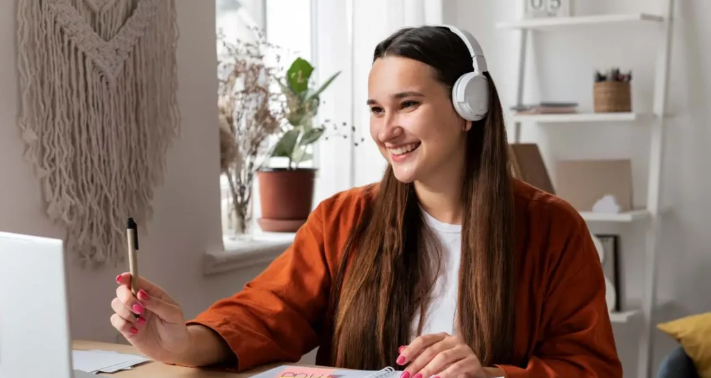 a girl is engaged in online learning