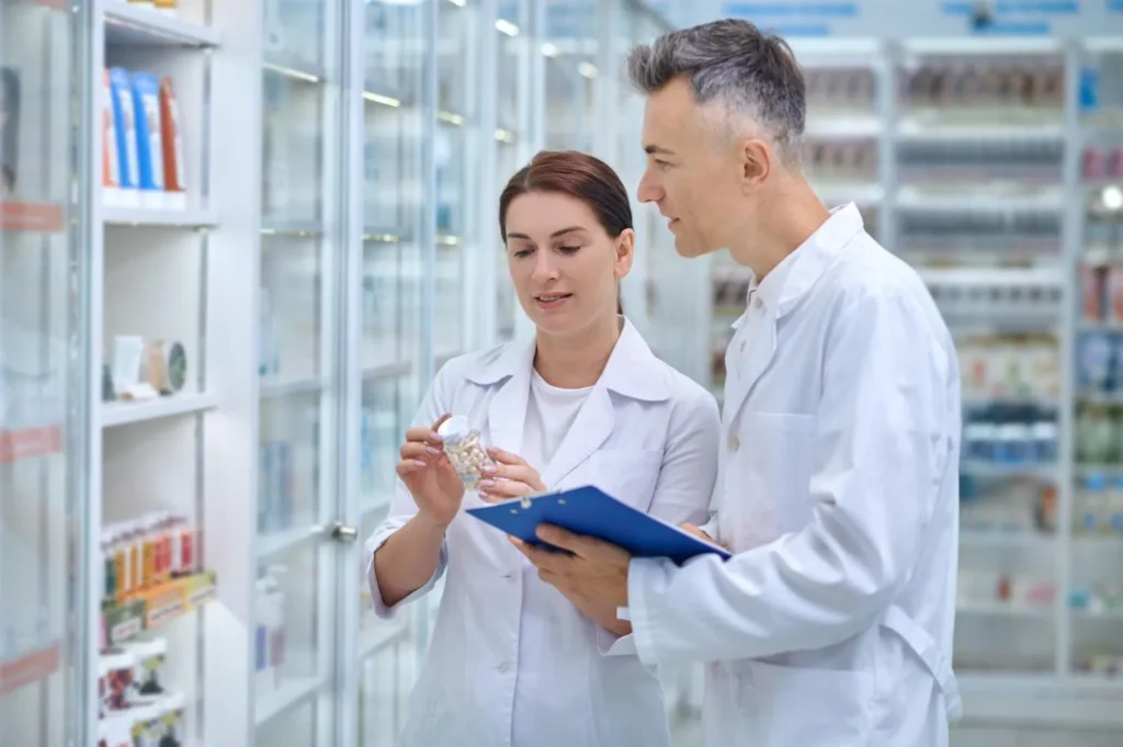 two pharmacy assistants are working in a clinic