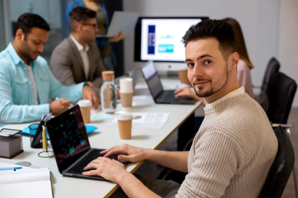a man working on a software development project with a team