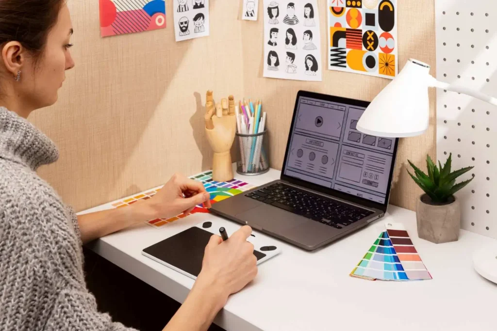 a woman doing a diploma in graphic design program